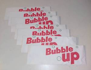 lot 3028 image: 7 Vintage Bubble Up Paper Soda Jerk Hats