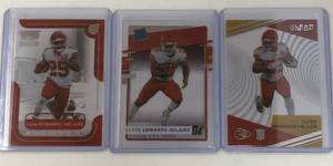 lot 1110 image: Three Mint 2020 Panini Clyde Edwards-Helaire Rookie Cards - All for One Money - Acrylic Cards - Donruss Clearly, Momentum, Clear Vision