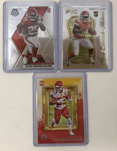 lot 1112 image: Three Mint 2020 Panini Clyde Edwards-Helaire Rookie Cards - All for One Money - Mosaic, Select Certified, and Gridiron Kings
