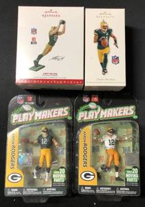 lot 1132 image: Four Green Bay Packers Sports Figures - Two Hallmark Ornaments & Two Aaron Rodgers Playmakers Toys