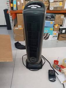 lot 1518 image: Lasko Moveable Air Heater with Remote M#751320 NOT TESTED