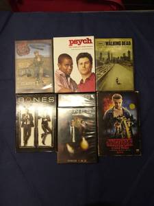 lot 136 image: Assorted DVDS Lot #6, Stranger Things on VHS, Bones is missing Disc 1 of Season 2