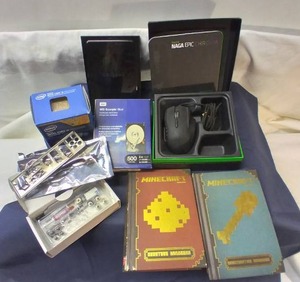 lot 148 image: Gaming Mouse, Netgear Router (no cords), Intel Core i5 Processor (not complete), Hard Drive, Minecraft Books and misc
