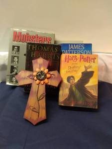 lot 157 image: Assorted Books, Including Mobsters and Harry Potter, and Wooden Cross