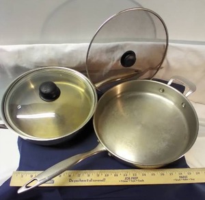 lot 159 image: 12 Revere Wear Skillet, 11 Wolfgang Puck Skillet, 11 Lid and Splatter Screen