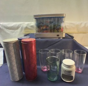lot 164 image: Assorted Drinking Glasses, 3 Decorative Tins, a Tea Light Candle Holder and an Electric Aquarium