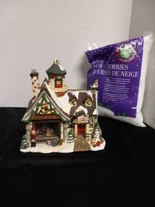 lot 5 image: Saturday Evening Post Norman Rockwell Freedom from Fear Lighted Porcelain House with a bag of snowflurries