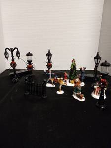 lot 8 image: Christmas Village Decorations - Some of the lamps can light up