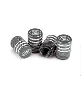 lot 6019 image: Land Rover black Laser Engraved Tire Valve Caps