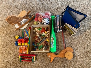 lot 138 image: Kids toys, VHS movies, Dry erase board, Wooden rocking horse