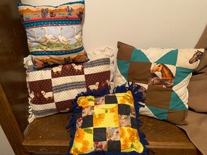 lot 180 image: Hand made quilted throw pillows