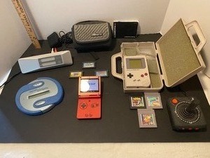 lot 193 image: Gameboy, Vintage Gameboy, Atari joystick, Catch phrase, SurfLink,