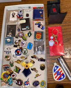 lot 279 image: Collection of pins, zippo keychain, bowling pins