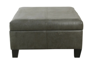 lot 63300 image: Copper Grove Mdina Large Faux Leather Storage Ottoman Retail$144.99
