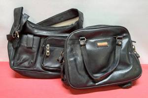 lot 53 image: 2- 2 Pocketed Purses, Including Cherokee, (Other is Genuine Leather)