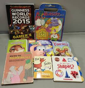 lot 158 image: Multiple Childrens Books & The Land Before Time DVD