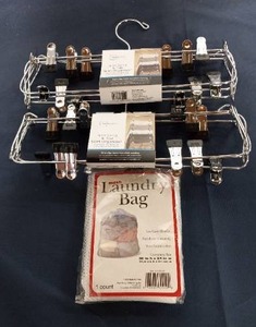 lot 201 image: 2 Skirt hangers ,Mesh Laundry Bag