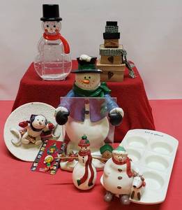 lot 19 image: Holiday Dcor Including Snowmen Picture Frames & Snowman Joy Plate, (Snowman needs to be glued, as shown in photo. Plate is 5-12. Lg Snowman Picture Frame is 9 & Sm. one is 6-12)