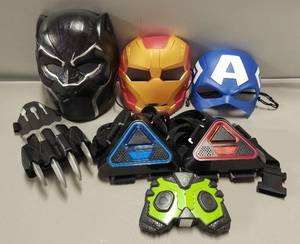 lot 73 image: 2- Sharper Image Laser Tag Set & Superhero Masks