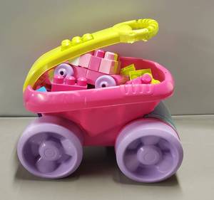 lot 89 image: Mega Blocks First Builders Block Scooping Wagon WBlocks, (Appears to have chew marks, mostly on handle. Shown in photos)