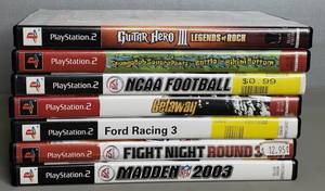 lot 100 image: Multiple Play Station 2 Games, Including Guitar Hero 2 & Madden 2003