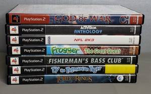 lot 101 image: Multiple Play Station 2 Games, Including God of War, Lord of the Rings & Fogger