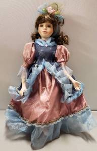 lot 113 image: Beautiful 17 Porcelain Doll, (One foot is broken, as shown in photo)
