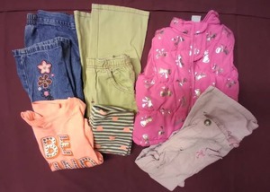 lot 324 image: Girls Siize 3T Pink Puffer Vest, 3 Pairs of Pants and Peach and Gray Outfit