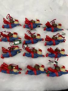 lot 1039 image: Lot of 12 Super Santa Christmas Ornaments