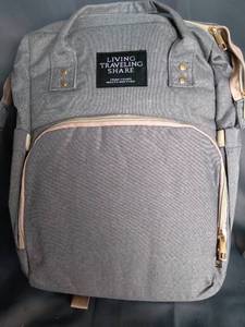 lot 17044 image: LIVING TDAVELING SHARE DIAPER BAG AND TO GO CRIB