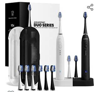 lot 681 image: AquaSonic Duo Dual Handle Ultra Whitening 40,000 VPM Wireless Charging Electric ToothBrushes - 3 Modes with Smart Timers - 10 Dupont Brush Heads & 2 Travel Cases Included