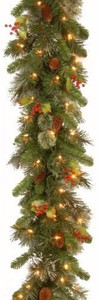 lot 6446 image: National Tree Company 9 Wintry Pine Garland With Cones, Red Berries, Snowflakes & 100 Clear Lights