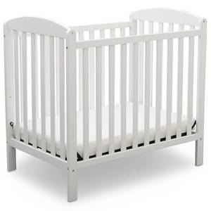 lot 30133 image: Delta Children Emery Mini Convertible Baby Crib with Mattress - Bianca White
