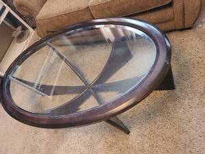 lot 1003 image: Mid Century modern oval coffee table with beveled glass top 51 x 32