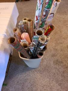 lot 1212 image: Large trash can with wrapping paper