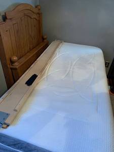 lot 1504 image: Twin XL mattress and box spring with headboard and footboard