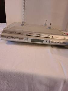lot 1303 image: Sony under counter CD playerclock radio with CDs and case