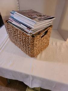 lot 1306 image: Assorted magazines in carry basket