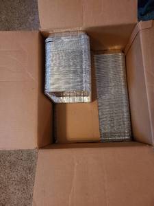 lot 1321 image: Eight inch square aluminum cake pans. 300-350 remaining in box