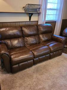 lot 1329 image: Leather like recliner sofa 86 inches long (great condition)