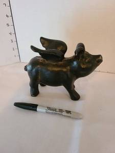 lot 1347 image: Cast iron pig with wings