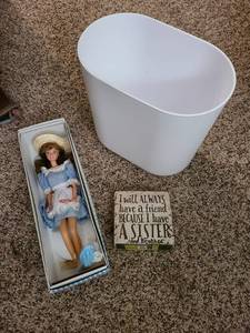 lot 1651 image: Little Debbie Barbie doll and sisters plaque