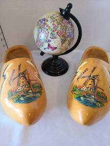 lot 1189 image: Wooden shoes and small globe with butterflies