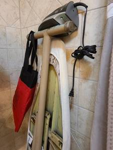 lot 1414 image: Ironing board and GE iron