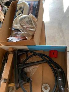 lot 2044 image: Used Pfister kitchen faucet and tub spout and wall drain trap and more