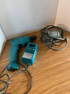 lot 2057 image: Makita battery operated drill and Craftsman electric drill
