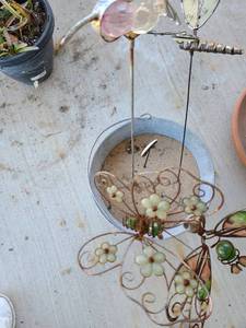 lot 3019 image: Yard art and bucket