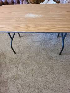 lot 3035 image: One brown 4 folding table