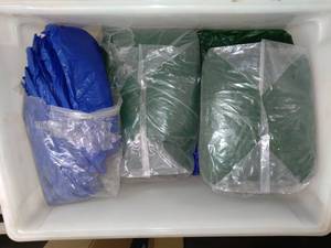 lot 1775 image: Tote Of Plastic Table Cloths Unknown Size And Quanity