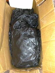 lot 1778 image: Black Plastic Table Cloths Unknown Size And Quanity